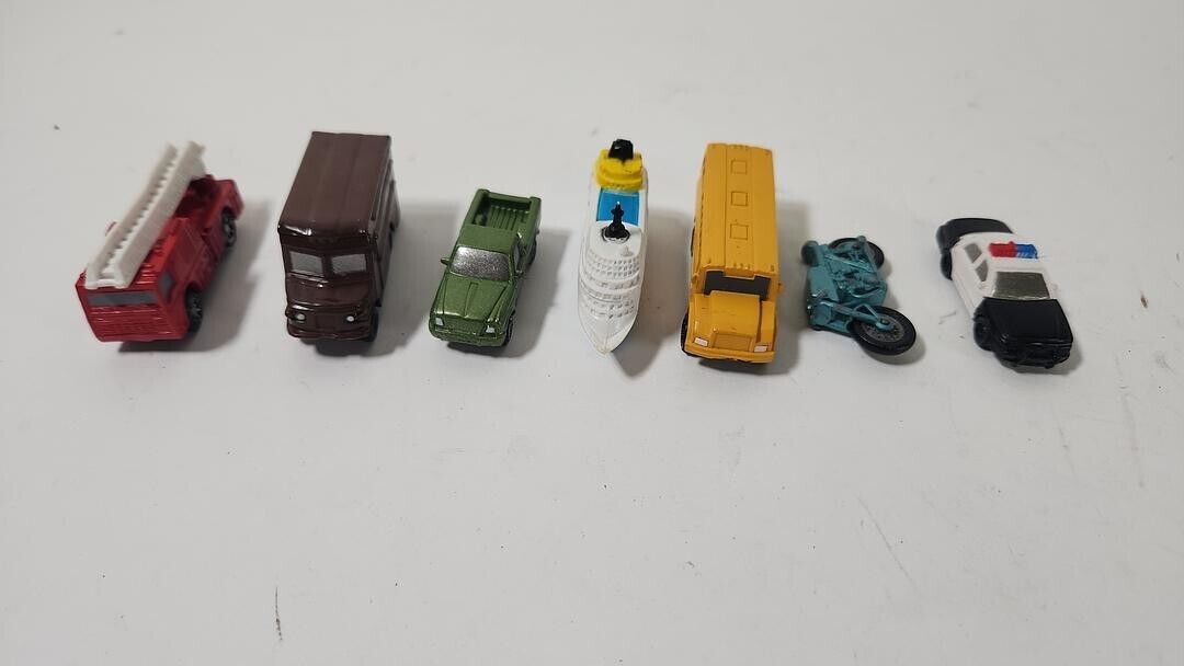 Small Lot of Safari LTD Vehicles