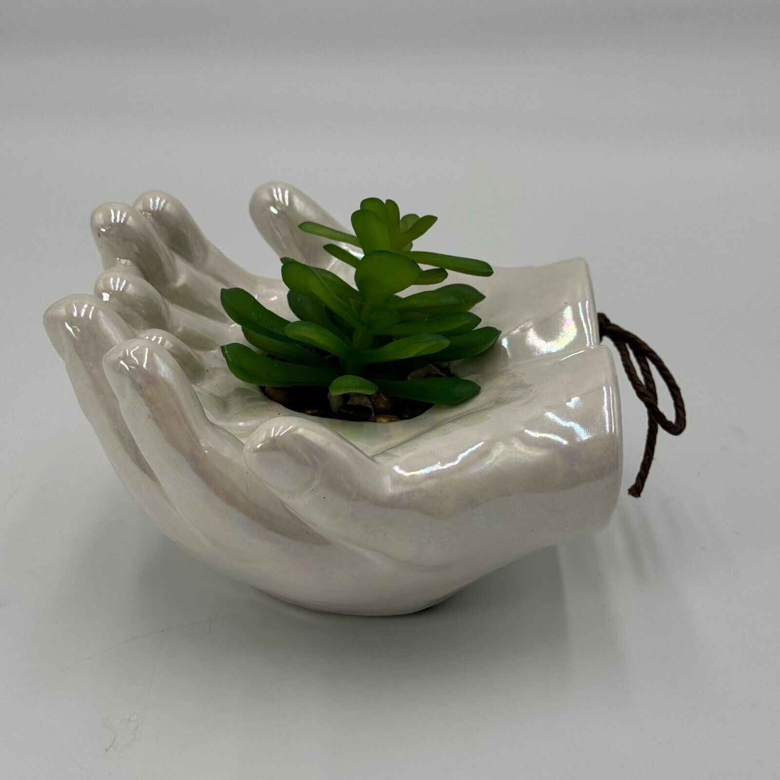 Ceramic Cupped Hands Holding Succulent in Rocks Artificial Fake Plant While Pot