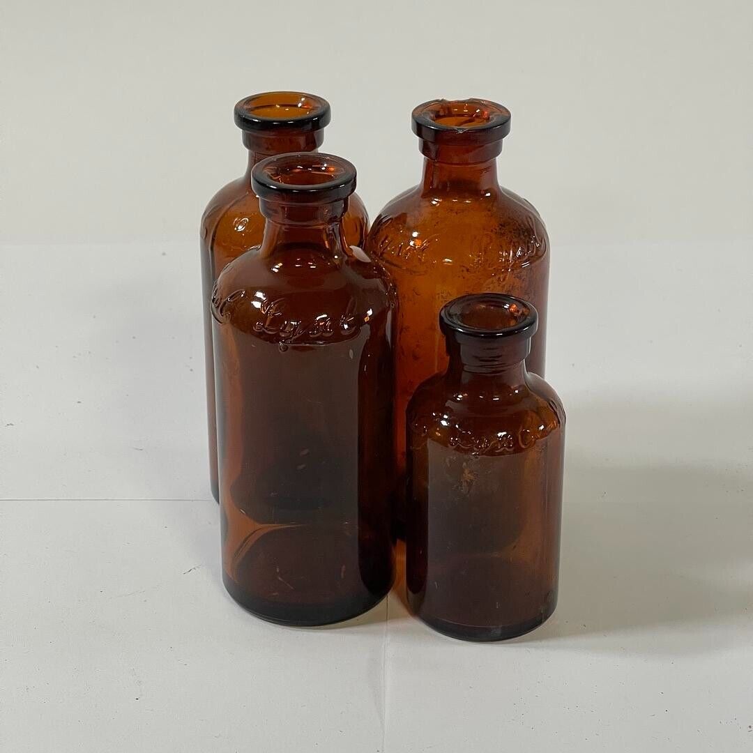 Lot of 4 Vintage Lysol Bottles Multifunctional Durable Amber - No Lid or Stopper