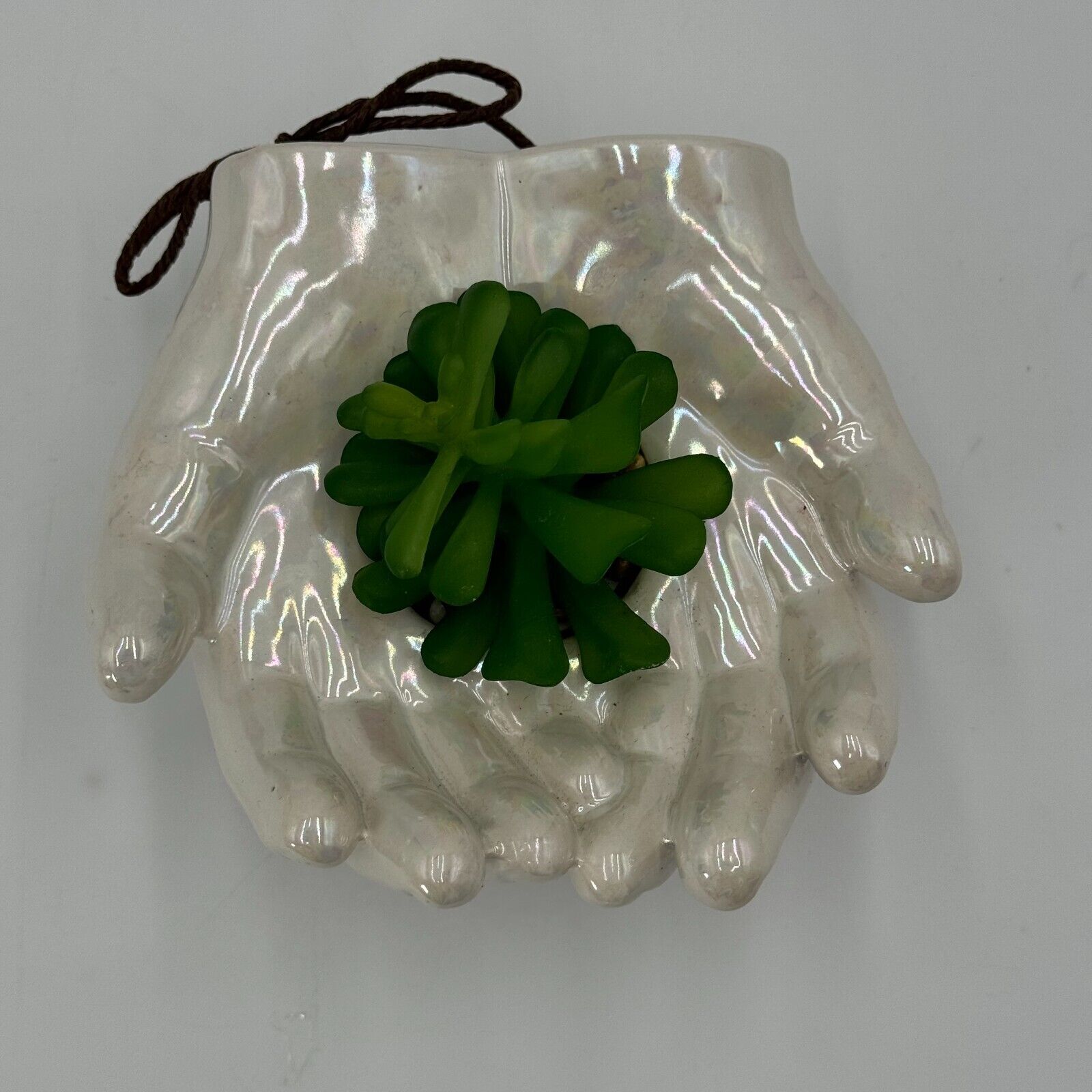 Ceramic Cupped Hands Holding Succulent in Rocks Artificial Fake Plant While Pot