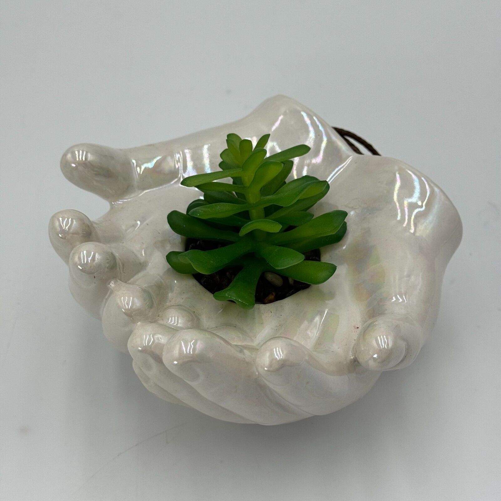 Ceramic Cupped Hands Holding Succulent in Rocks Artificial Fake Plant While Pot