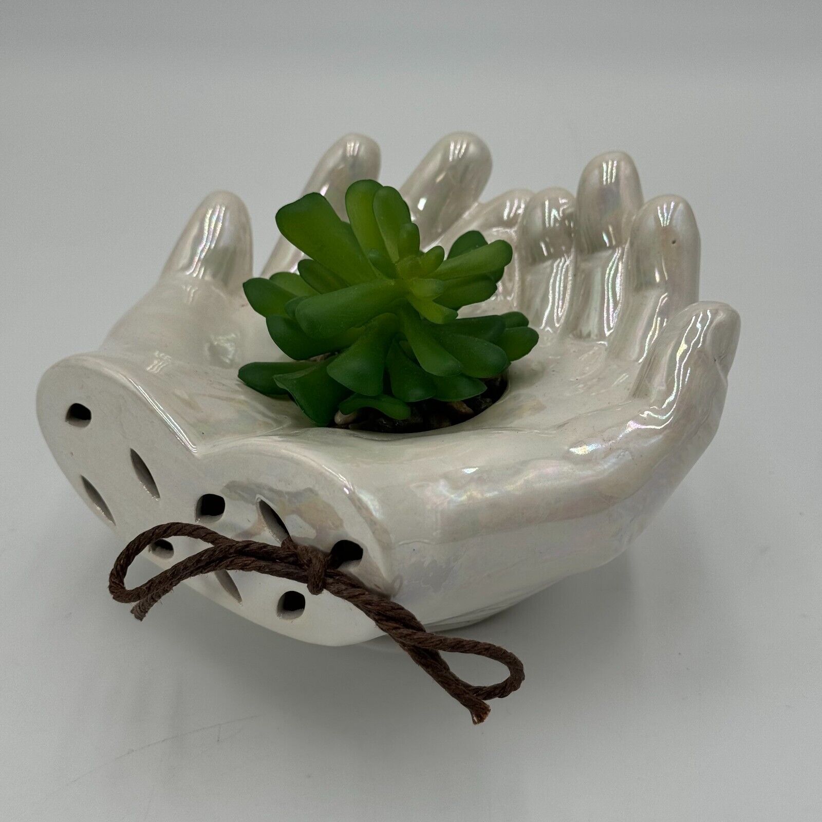 Ceramic Cupped Hands Holding Succulent in Rocks Artificial Fake Plant While Pot