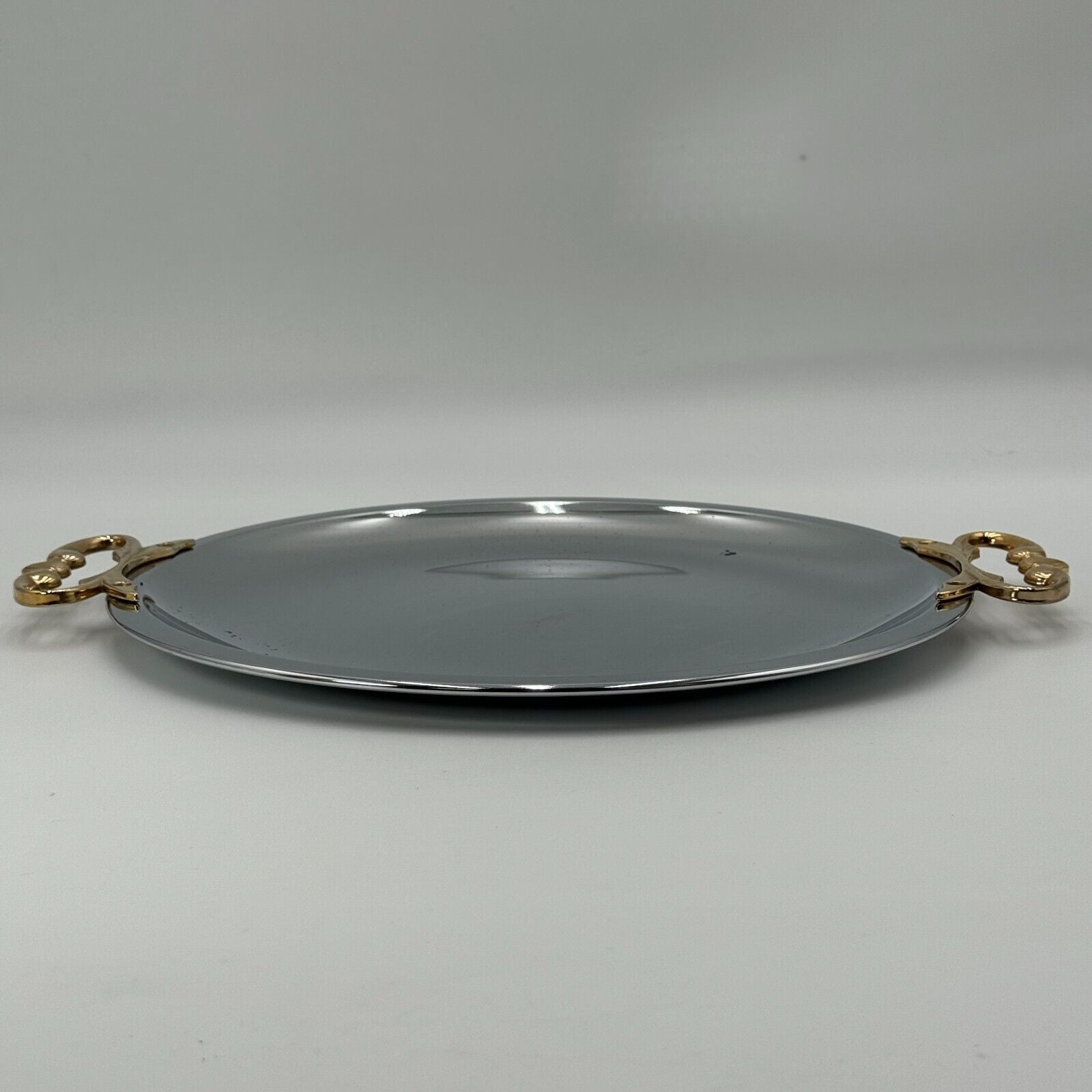 VINTAGE KROMEX CHROME METAL SERVING TRAY PLATTER ROUND WITH BRASS HANDLES 13.5"