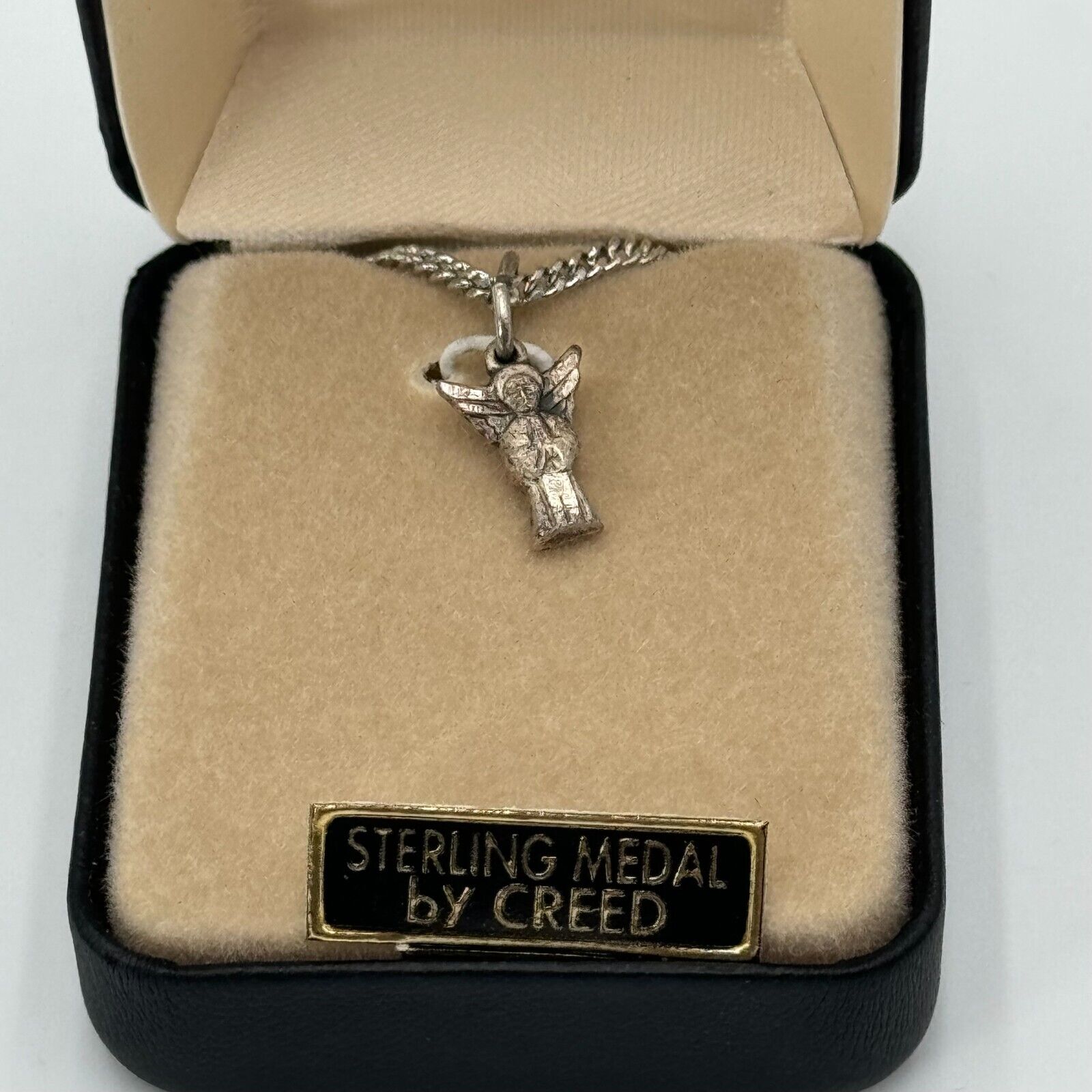 Creed  18 in Chain Style Sterling Silver Necklace With Baby Guardian Angel Penda