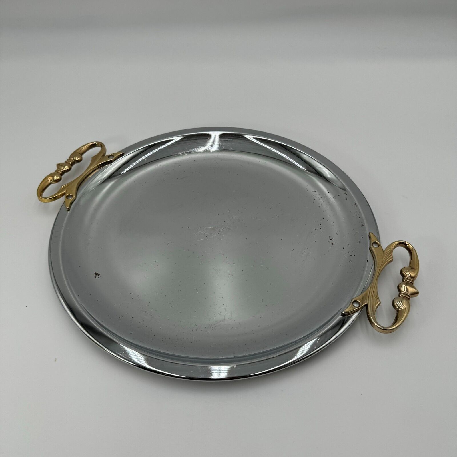 VINTAGE KROMEX CHROME METAL SERVING TRAY PLATTER ROUND WITH BRASS HANDLES 13.5"