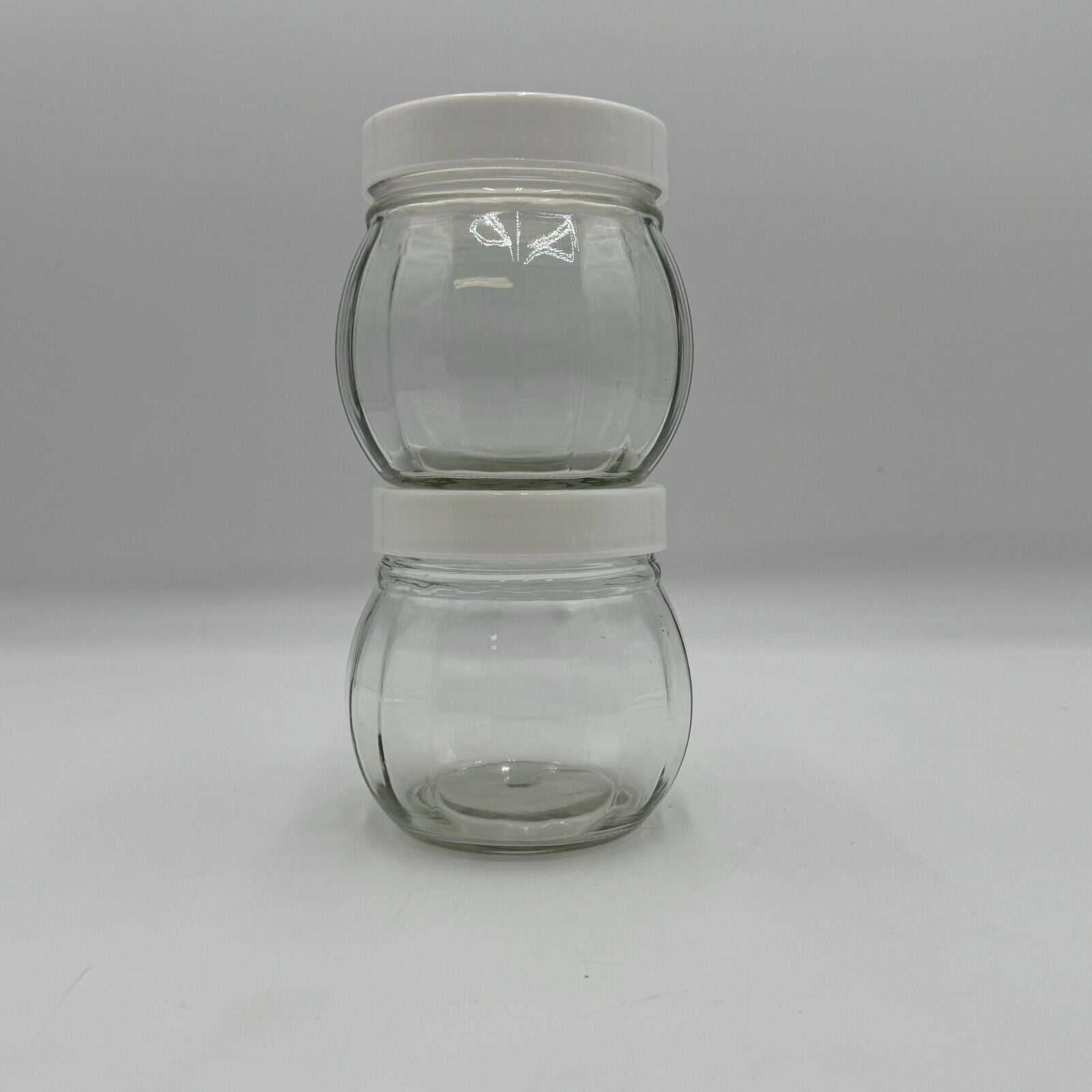 Set of 2 Round Spherical Clear Glass Jars With White Plastic Lids Stackable 4.5"