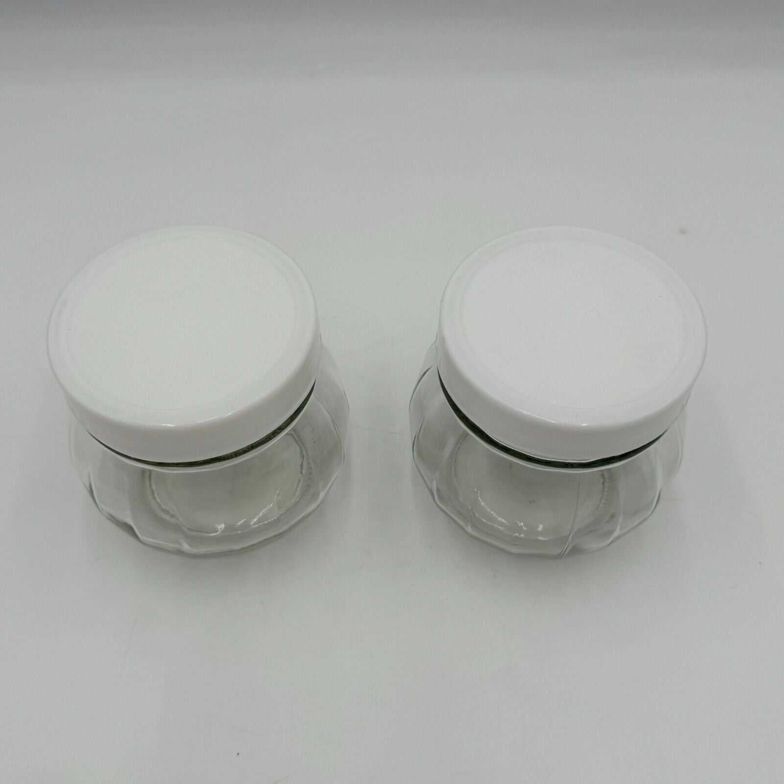 Set of 2 Round Spherical Clear Glass Jars With White Plastic Lids Stackable 4.5"